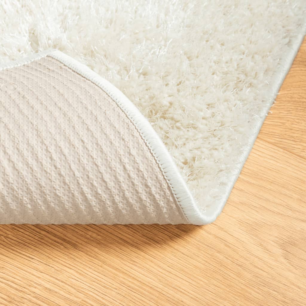 Vloerkleed ISTAN hoogpolig glanzend 80x150 cm crèmekleurig - AllerleiShop