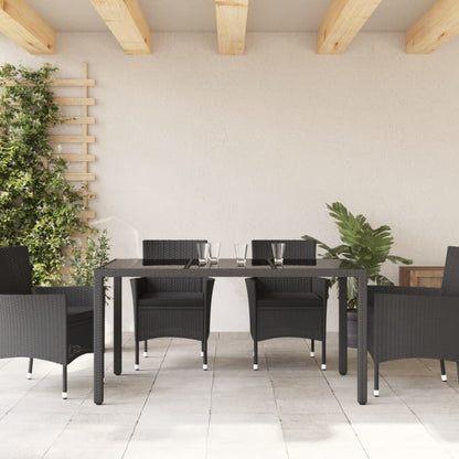 Tuintafel met glazen blad 150x90x75 cm poly rattan zwart - AllerleiShop