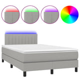 Boxspring met matras en LED stof lichtgrijs 120x190 cm