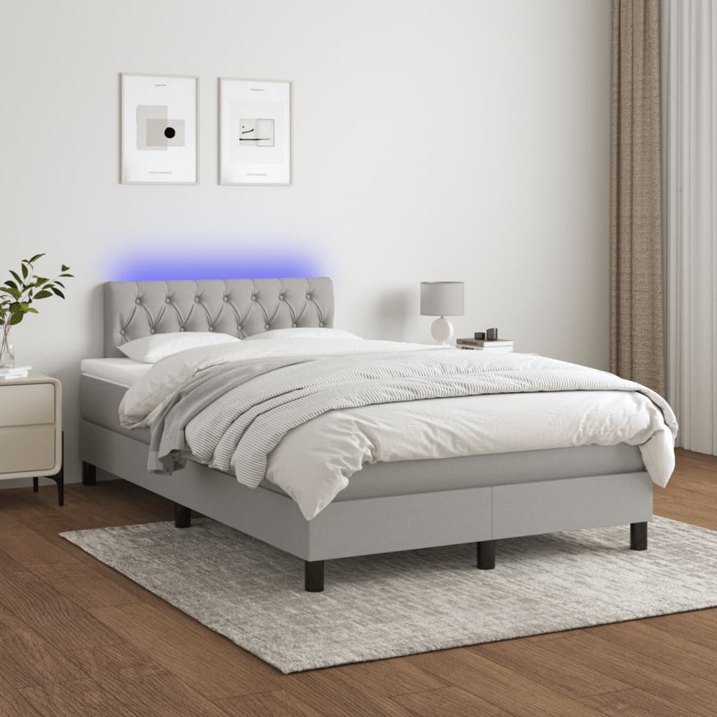 Boxspring met matras en LED stof lichtgrijs 120x190 cm