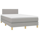 Boxspring met matras en LED stof lichtgrijs 120x190 cm