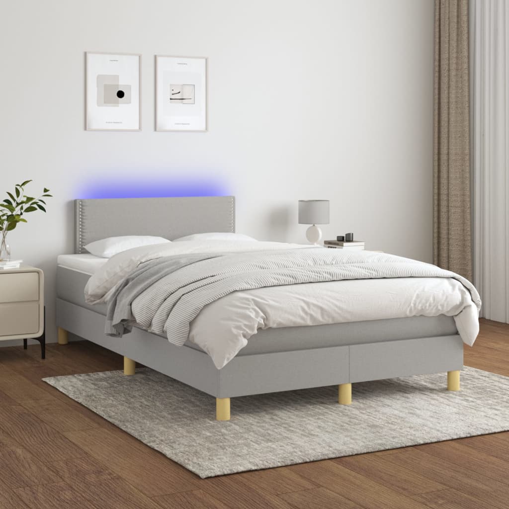 Boxspring met matras en LED stof lichtgrijs 120x190 cm