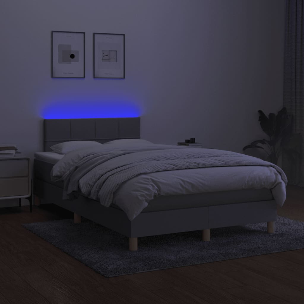 Boxspring met matras en LED stof lichtgrijs 120x190 cm