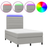 Boxspring met matras en LED stof lichtgrijs 120x190 cm