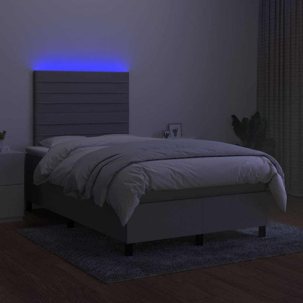Boxspring met matras en LED stof lichtgrijs 120x190 cm