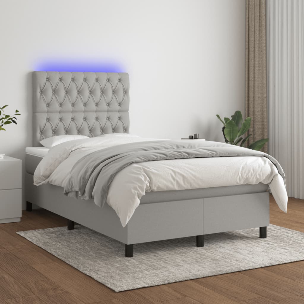 Boxspring met matras en LED stof lichtgrijs 120x190 cm