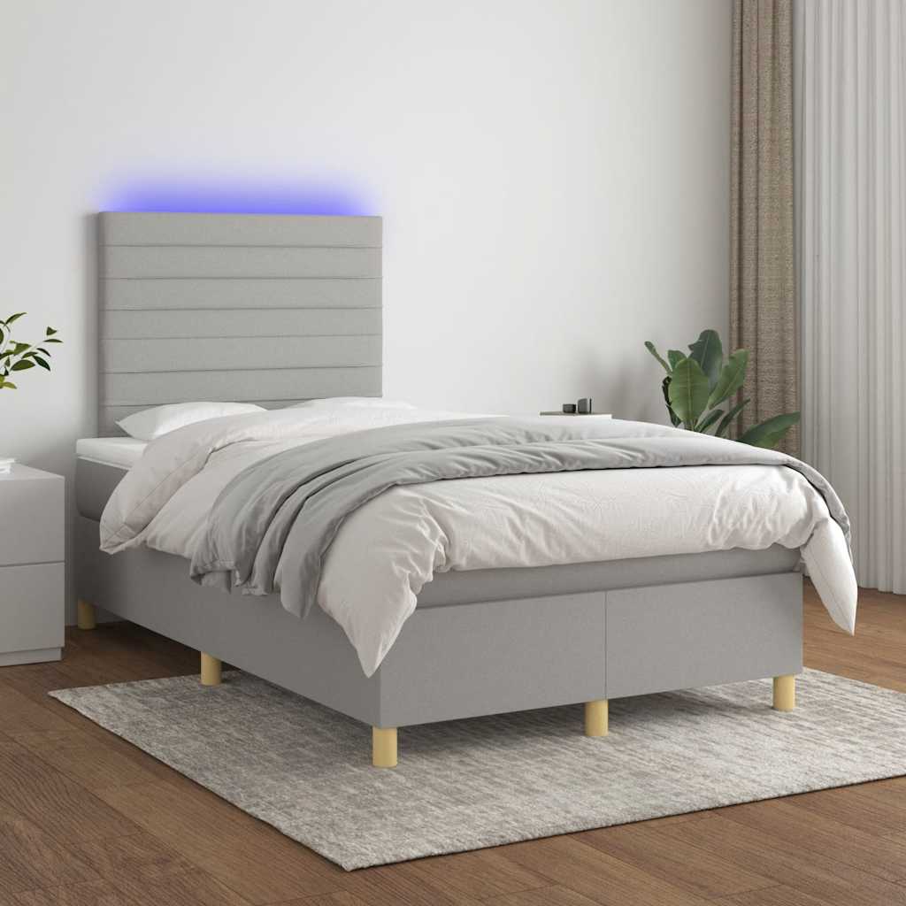 Boxspring met matras en LED stof lichtgrijs 120x190 cm