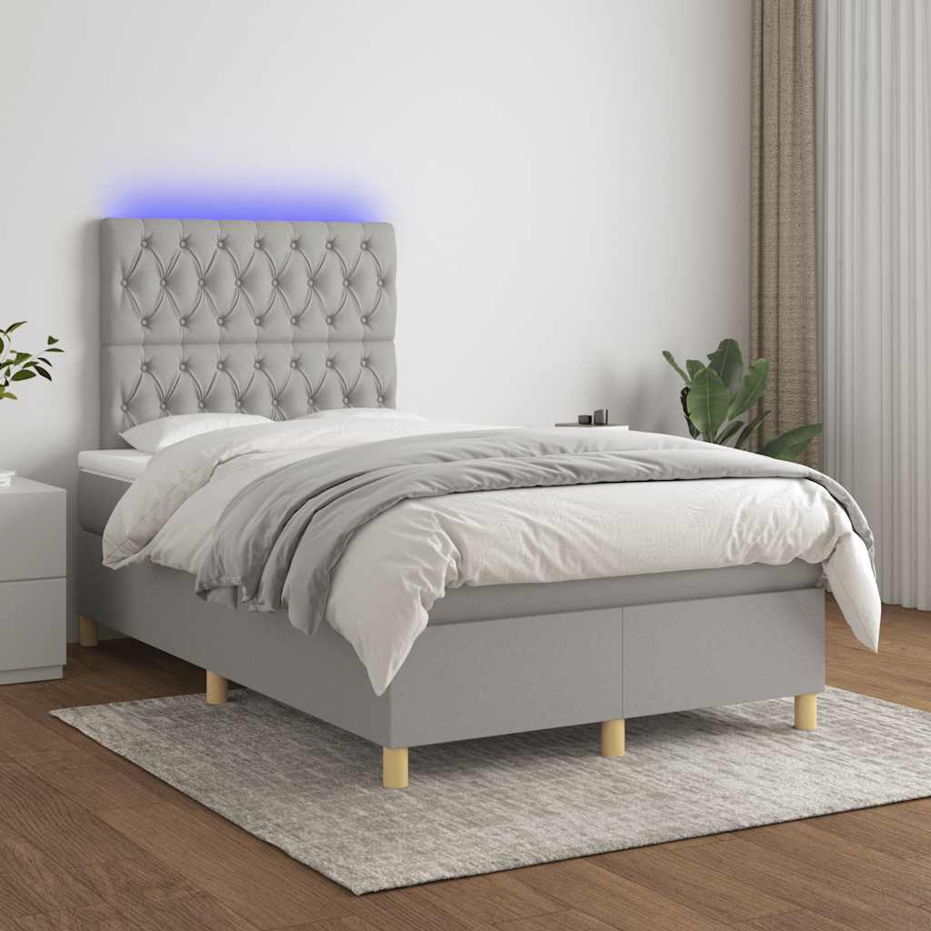 Boxspring met matras en LED stof lichtgrijs 120x190 cm