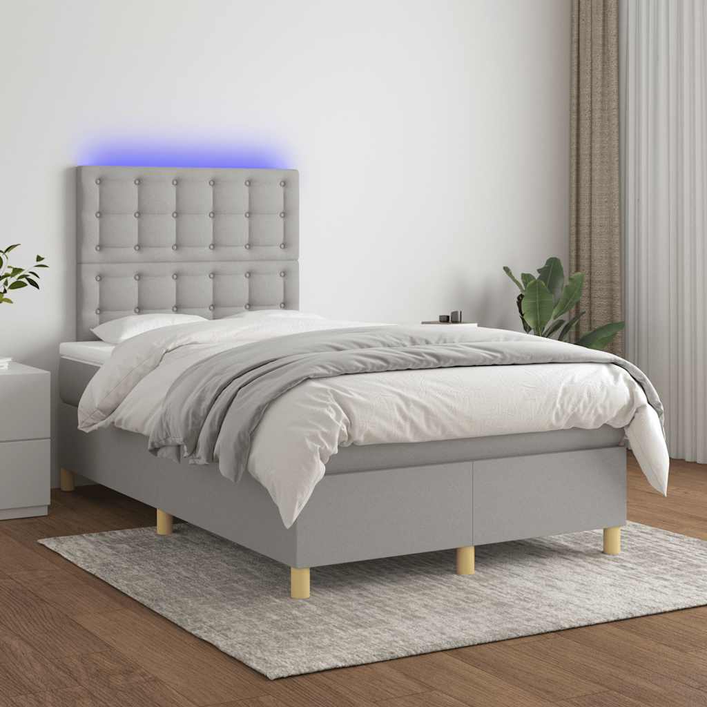 Boxspring met matras en LED stof lichtgrijs 120x190 cm