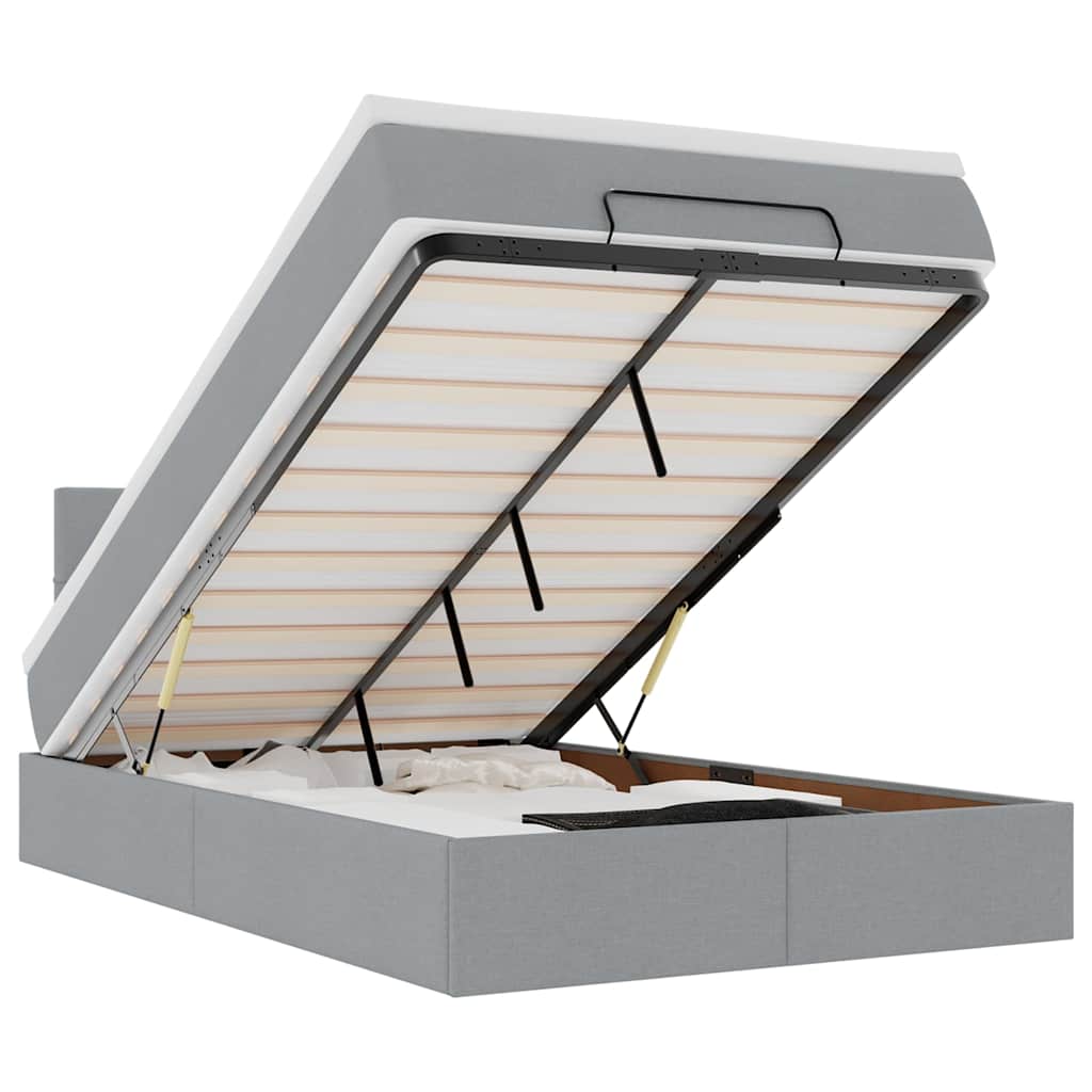 Ottoman bed met matras en LED's 120x190 cm stof lichtgrijs