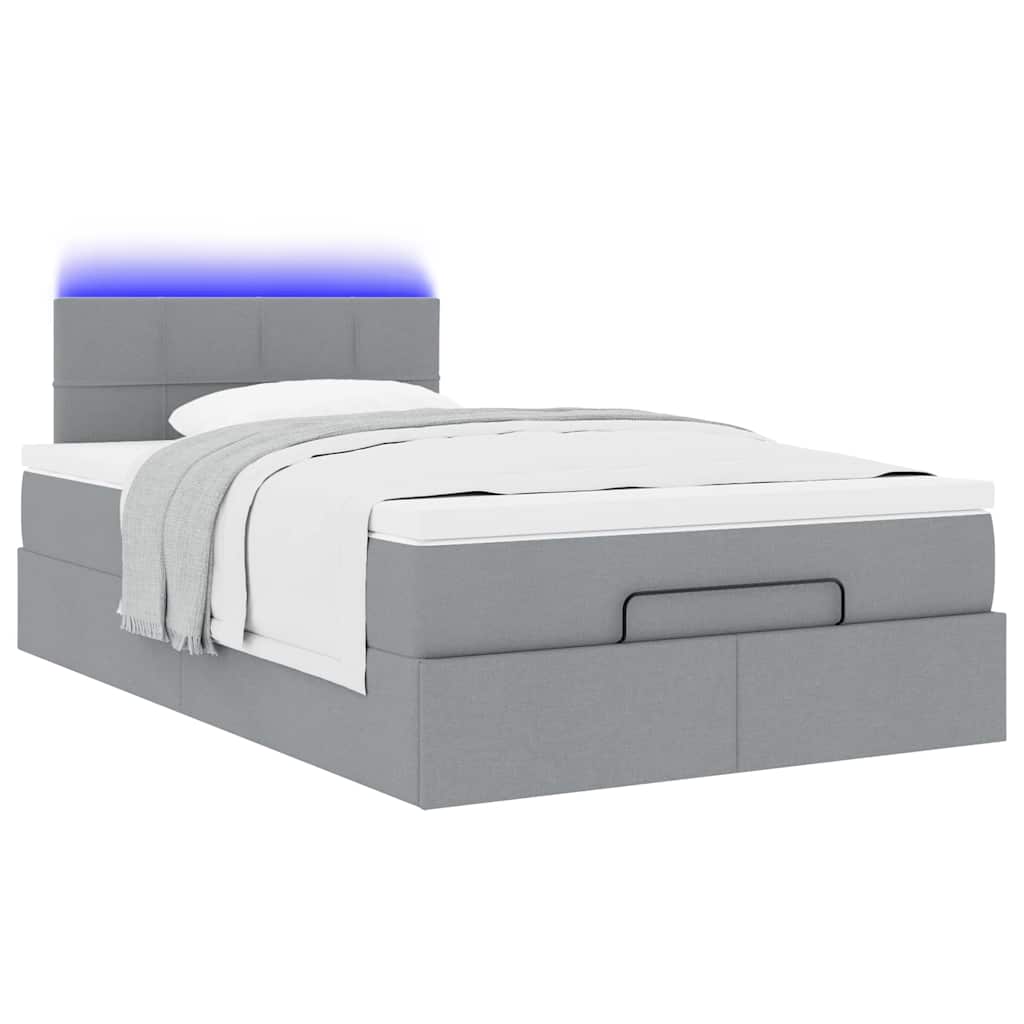 Ottoman bed met matras en LED's 120x190 cm stof lichtgrijs