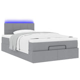 Ottoman bed met matras en LED's 120x190 cm stof lichtgrijs